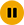 Pause icon inside an orange circle